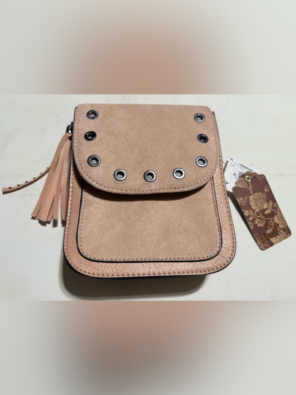 Suede Mini Crossbody with Tassel and Grommet Detail in Blush